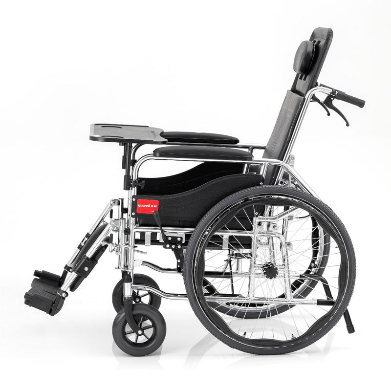 Silla de ruedas con almohada, mesa y cómodo